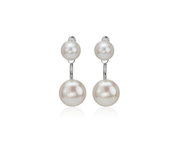 These modern, fashionable pearl earrings showcase four freshwater cultured pearls and a front-back design. The lower ear jacket is removable, so they can also be worn as studs for added versatility.