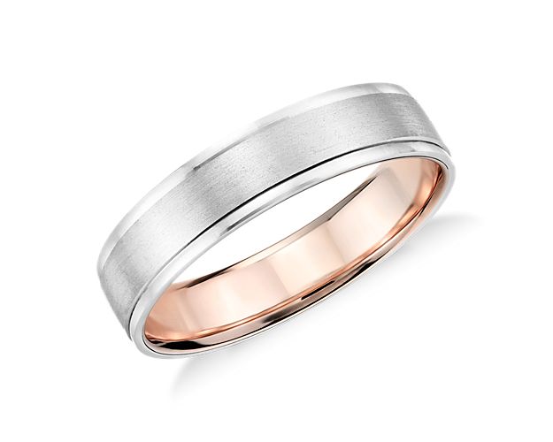 Solidify your love with this platinum and 18k rose gold wedding ring, showcasing a two-tone interior accent and a brushed finish.