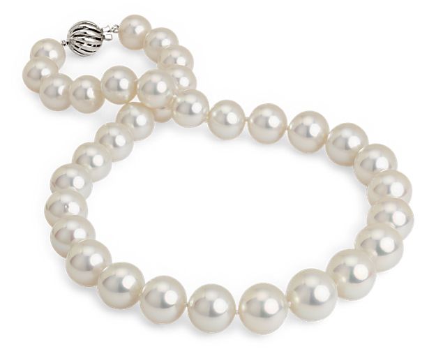 Impressive elegance. This lustrous South Sea pearl necklace, showcases a striking cage clasp and a securely hand-knotted silk cord.