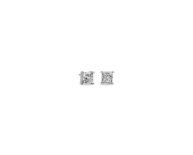 Brilliance is defined by these diamond stud earrings showcasing three-carat princess-cut diamonds (3 ct. tw.) embraced by a 14k white gold four-prong setting with guardian backs.