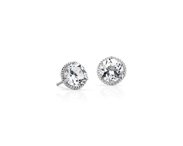 Show off a classic with these white topaz gemstone earrings, framed in sterling silver and finished off with elegant rope detailing.