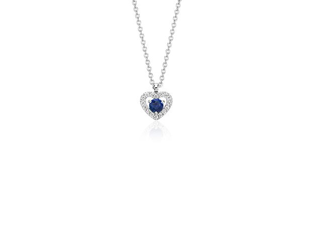 This sweet and delicate heart pendant features a brilliant sapphire surrounded by diamond pavé in 14k white gold. The perfect gift for that someone special or a lovely treat for one's self. This pendant can be worn at 16 or 18 inches.