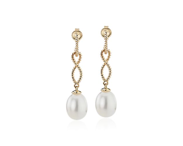 Adding a touch of glamour is easy with these infinity twisted drop-style earrings, each displaying the soft shimmer of two naturally beautiful freshwater cultured pearls.