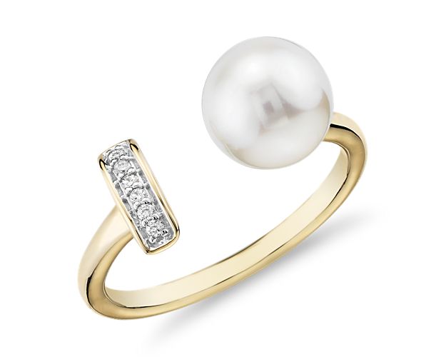 Wear glamour in total comfort and exceptional elegance with this open-style 14k yellow gold band presenting a bar of six round diamonds and a lustrously soft freshwater cultured pearl. Due to this ring's delicate nature, we do not recommend for daily wear and are unable to resize or repair.
