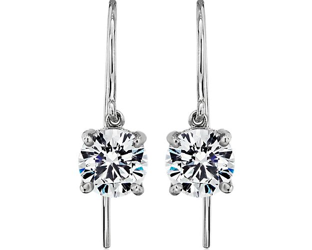 These classic platinum earring settings will compliment your choice of round diamonds. Each earring is French pavé-set with round diamonds for a brilliant finishing touch.