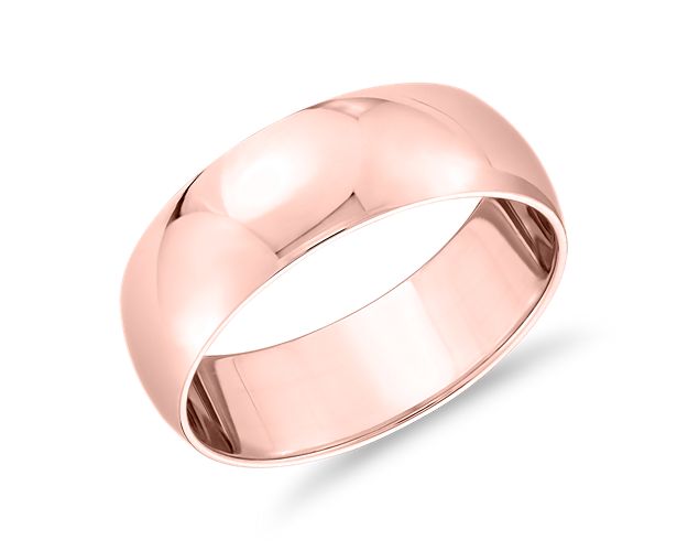 This classic 14k rose gold wedding ring will be a lifelong essential. The 7mm width is perfect for someone who prefers a more substantial look with a low profile aesthetic that's perfect for everyday wear. The high polished finish and goes-with-anything styling are a timeless design.
