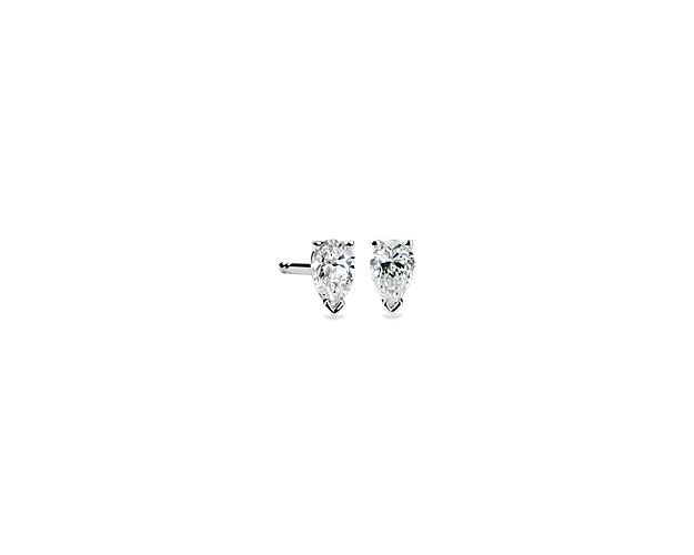 Classic and beautifully matched, these stud earrings feature near-colorless pear shape diamonds set in 14k white gold four-prong settings with double-notched friction posts. Each earring weighs roughly 1/4 carat, for a total diamond weight of 1/2 carat.