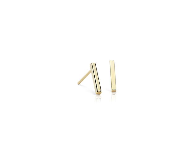 These bar stud earrings, forged in 14k yellow gold, are perfectly on-trend, compulsively wearable, and a chic everyday look.