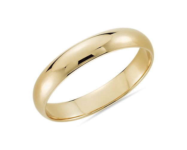 This classic 14 yellow gold wedding ring will be a lifelong essential. The light overall weight of this style, its classic 4mm width, and low profile aesthetic make it perfect for everyday wear. The high polished finish and goes-with-anything styling are a timeless design.