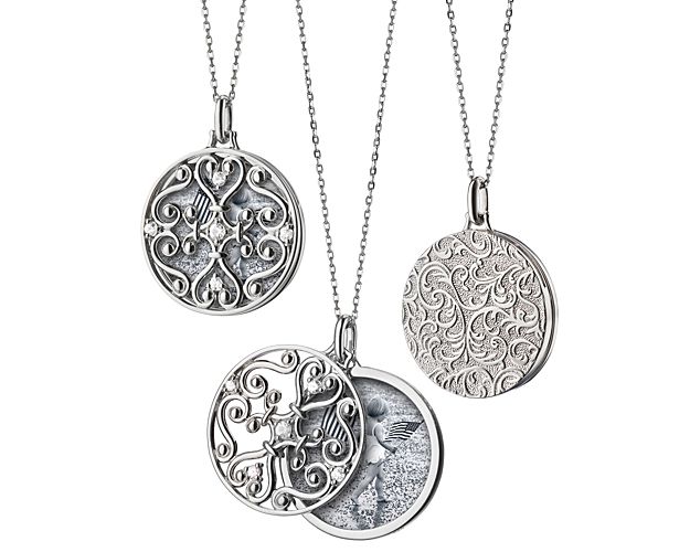 Inspired by a peek through a garden gate, the front of Monica Rich Kosann's gate locket in sterling silver slips aside to reveal a photo of your nearest and dearest. Accents of white sapphires adds a bit of sparkle and at 32-inches long, this piece will always be close to your heart.