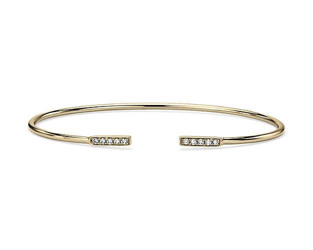 Cuff bangle bracelet in yellow gold with diamonds