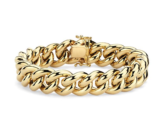 Go for the gold with this oversized curb chain bracelet. Crafted with hollow chain links in 14k Italian yellow gold, this bracelet is a timeless statement piece.