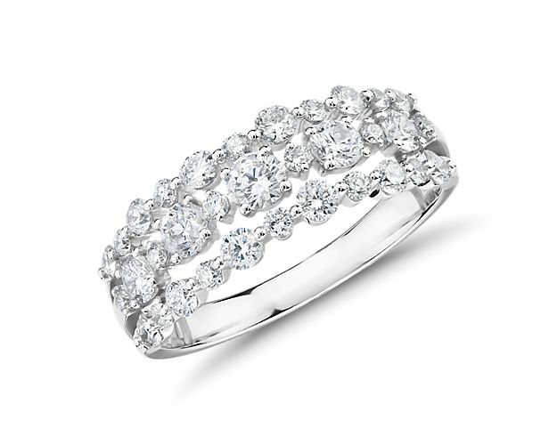 Show off your love of diamonds with this fabulous trio of sparkling rows in 14k white gold bearing prong-set round diamonds in varying sizes for maximum reflection on this right hand ring. Due to this ring's delicate nature, we do not recommend for daily wear and are unable to resize or repair.