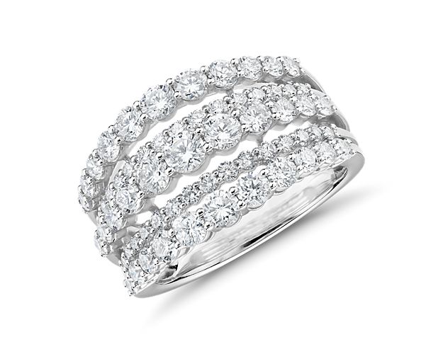 You could be forgiven for mistaking this dazzling ring for a fashionable ring stack, but it's just one, crafted from 14k white gold and flaunting an array of varying sizes and 2 carats total of round-cut diamonds for making the most brilliant of impressions. Due to this ring's delicate nature, we do not recommend for daily wear and are unable to resize or repair.