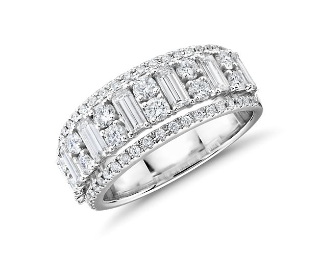 There's nothing reserved about this fantastically brilliant display of varying sizes of round-cut diamonds alternating with big, bold emerald-cut diamonds, all prong set in bright 14k white gold. Due to this ring's delicate nature, we do not recommend for daily wear and are unable to repair.