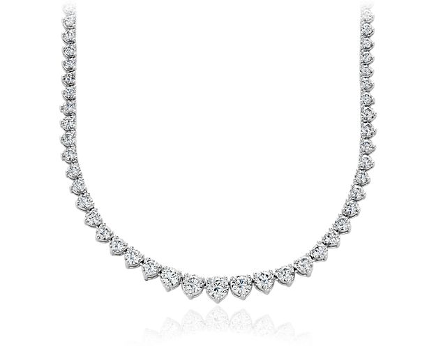 Understated elegance with sparkle to spare, this eternity diamond necklace is a timeless piece of jewelry and no-fail gift. Graduated round brilliant-cut diamonds are perfectly matched and hand-set in gleaming 18k white gold. This classic eternity necklace features 10 ct. tw. of maximum sparkle.