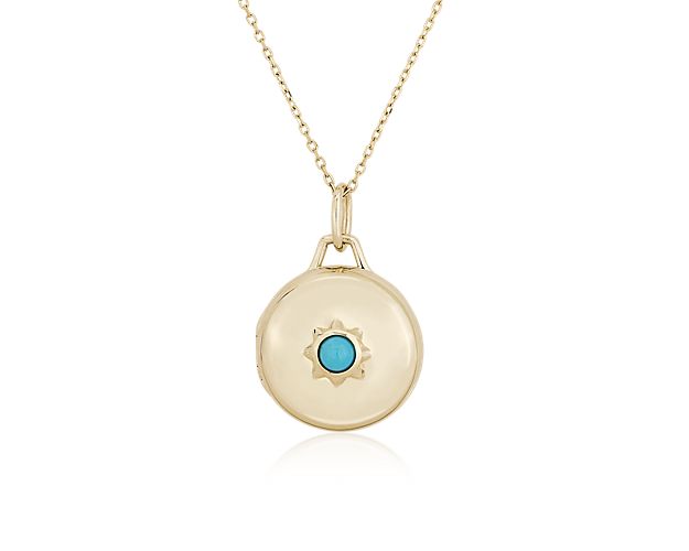 Tuck a favorite photo in this round locket featuring 18k yellow gold design and a matching chain. A bright blue turquoise stone is set in the center with an eye-catching star bezel.