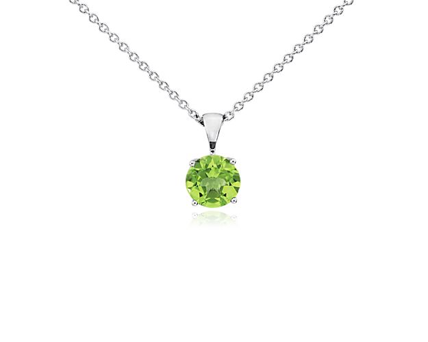 Vibrant and colorful, this gemstone pendant features a bright and cheerful peridot set in a 14k white gold four-prong setting suspended from a dainty 18-inch cable chain. A classic piece of everyday luxury and the birthstone for August.