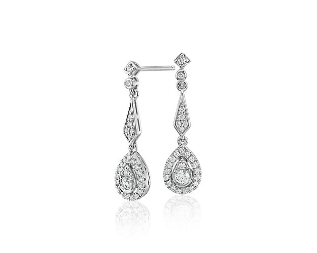 The delicate details of these vintage-inspired diamond teardrop earrings are perfect for a bride's big day or dressing up any occasion. Round brilliant-cut diamonds glitter in 14k white gold settings that hang at a demure, wearable length.