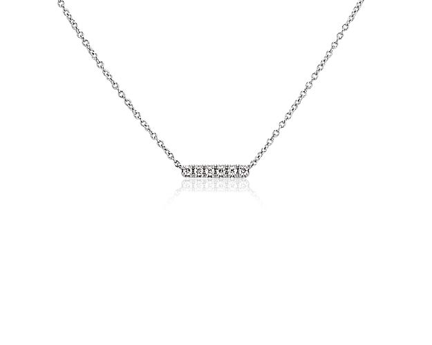 Slip on some sparkle and go into the day with style. This versatile everyday jewelry goes on easy with its cable chain and presents 14k white gold set with six round-cut diamonds. 
