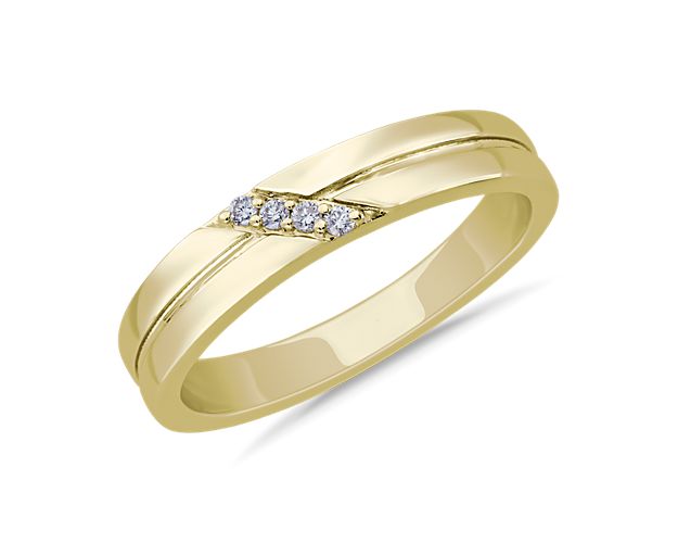 Bright diamonds are set in a beautifully angled diagonal along the front of this ring. It is crafted from luxurious 14k yellow gold that promises an enduring gleam.