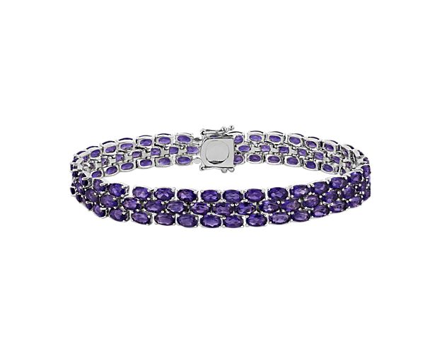 Show your true color with this amethyst bracelet crafted in sterling silver featuring more than 90 oval amethyst gemstones in a flexible triple line design.