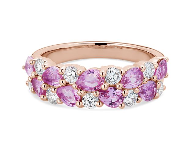 Enjoy the stunning sparkle of this ring featuring a double row of gorgeous pear-cut pink sapphires nestled amid shimmering round-cut diamonds. It is designed in 14k rose gold for a look that promises enduring beauty and quality.