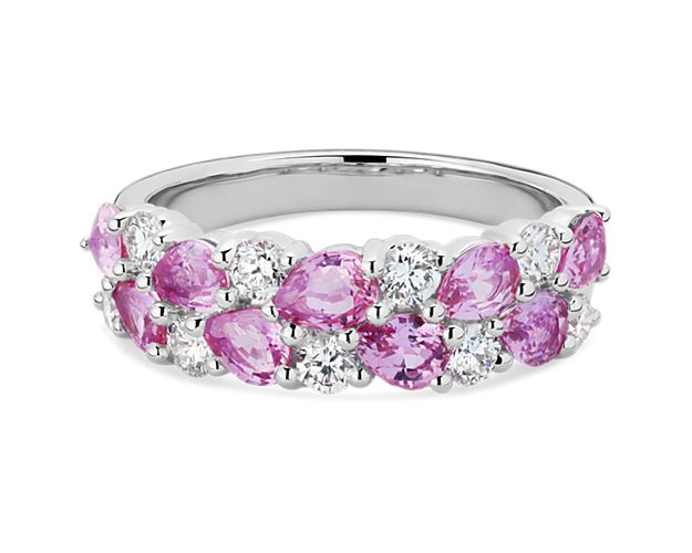 Enjoy the stunning sparkle of this ring featuring a double row of gorgeous pear-cut pink sapphires nestled amid shimmering round-cut diamonds. It is designed in 14k white gold for a look that promises enduring beauty and quality.
