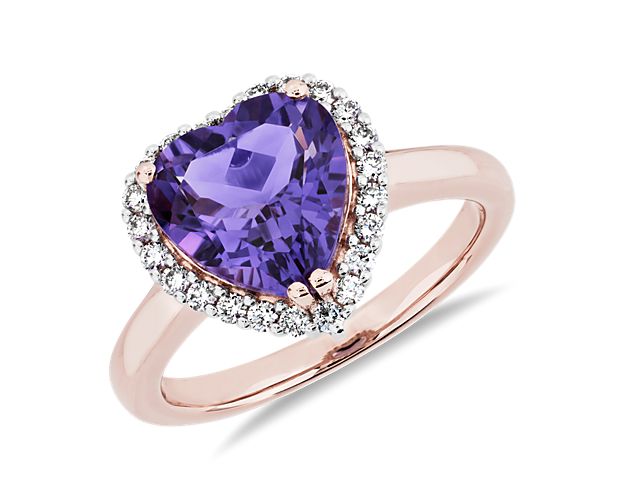 A heart-shaped purple amethyst adds winsome romance to this stunning ring, while a brilliantly sparkling halo elevates its style. The warm gleam of the 14k rose gold design finishes the look with soft allure.