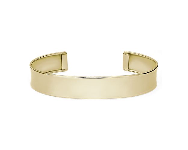 Slip on this sleek cuff bracelet to instantly elevate your style with timeless sophistication. The highly polished 14k yellow gold design catches the light with a breathtaking rich lustre.