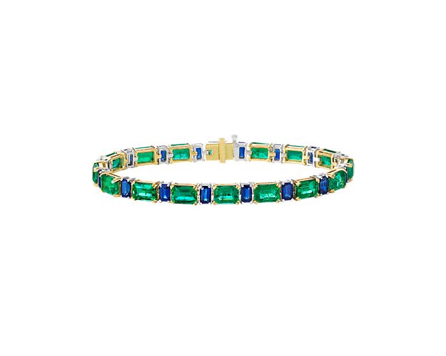 Emeralds and sapphires come together perfectly to create this stunning bracelet. Set in luxurious 18k yellow gold, this bracelet is truly a one-of-a-kind creation.