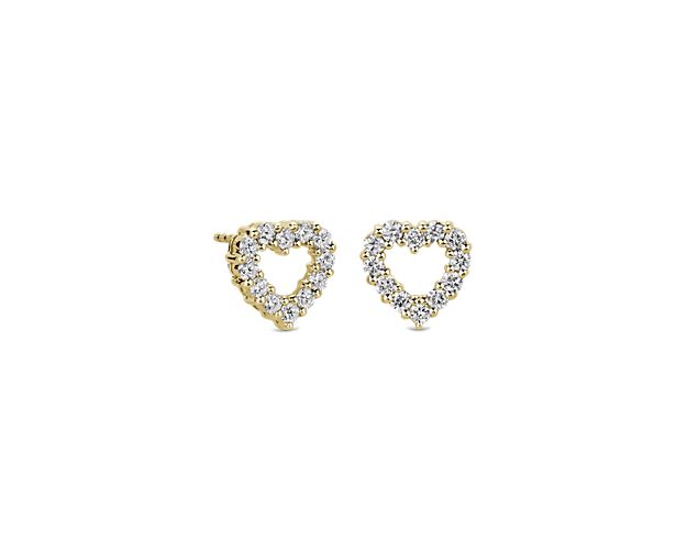 Add a hint of romance to your style with these delicate stud earrings featuring a hollow diamond-shaped design in gleaming 14 yellow gold. Each heart shimmers with intricate diamonds set along its outline, adding sparkle as they catch the light.