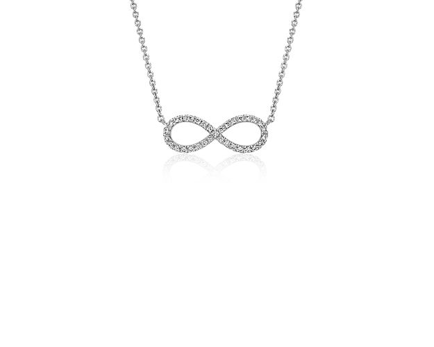 Brilliant and meaningful, this small infinity diamond pendant features round diamonds pave-set in 14k white gold with a matching cable chain necklace. This necklace can be worn at 16 or 18 inches in length.