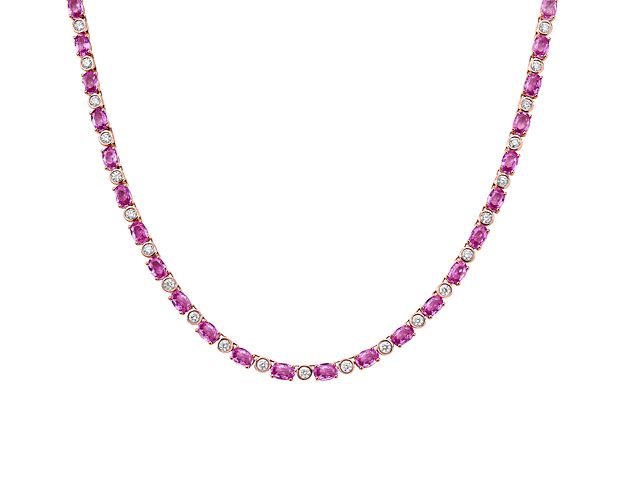 This standout pink sapphire and diamond necklace adds a little color to the classic eternity necklace. Vibrant prong-set pink sapphires, alternating with round brilliant pave-set diamonds, allows extra light in for more stunning color. A subtle box catch with hidden safety secures the necklace.