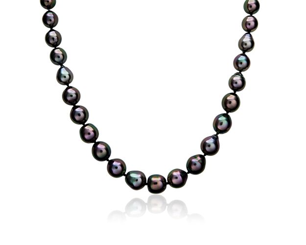 Redefine a timeless style with the opulence of this strand of black Tahitian cultured pearls.  Set in 14k white gold, this necklace features pearls ranging from 8 to 10.5mm.