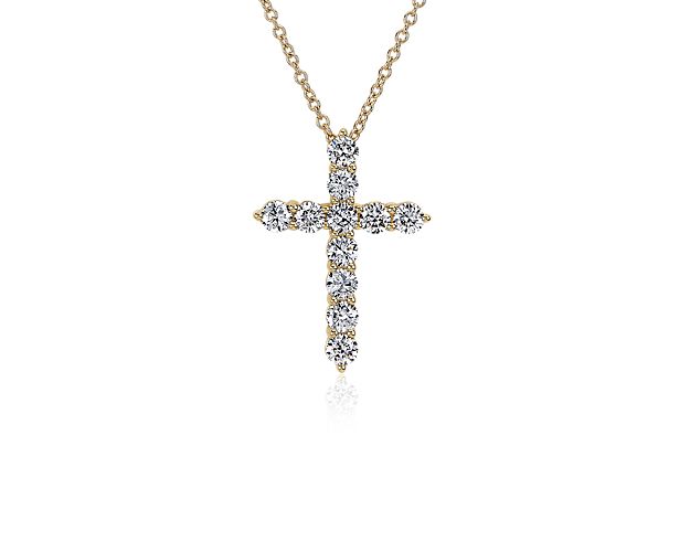 Let your faith sparkle and shine when you wear this cross necklace crafted in 14k yellow gold. The cross is beautifully set with stunning lab grown diamonds that catch the light for a radiant effect.