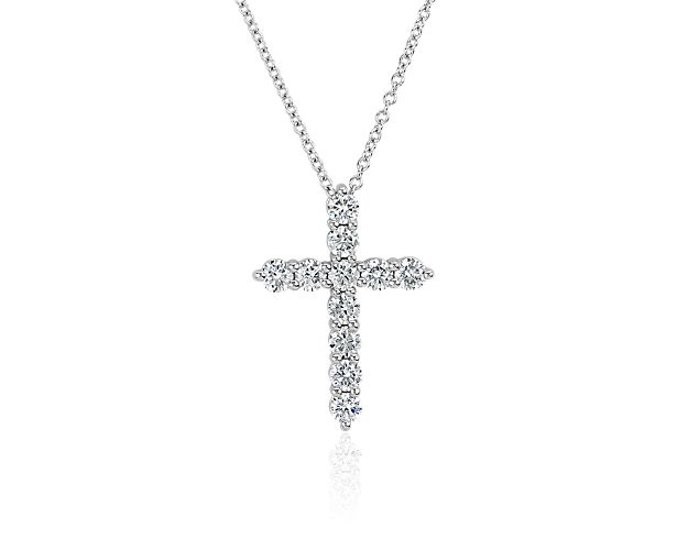 Let your faith sparkle and shine when you wear this cross necklace crafted in 14k white gold. The cross is beautifully set with stunning lab grown diamonds that catch the light for a radiant effect.