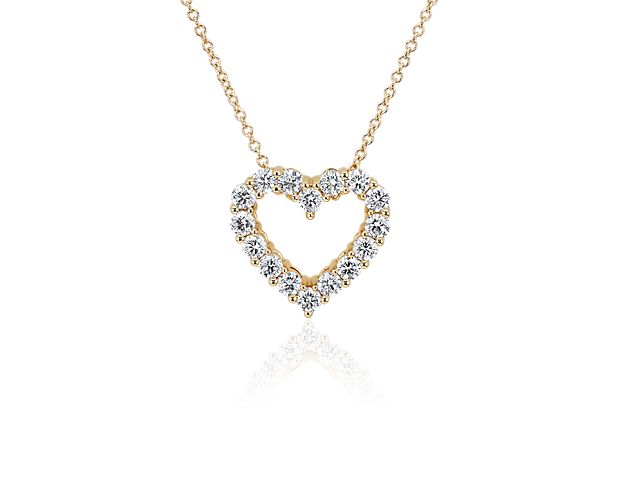 Yellow gold heart necklace with lab grown diamonds.