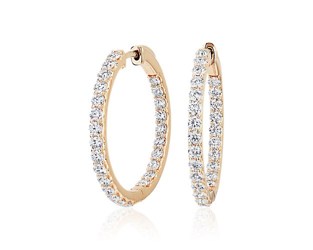 Gorgeously shimmering and timelessly elegant, these eternity hoop earrings feature lab-grown diamonds set along the front-facing edges and are a breath-taking addition to your look. They are designed in lustrous 14k white gold for luxurious quality that endures.