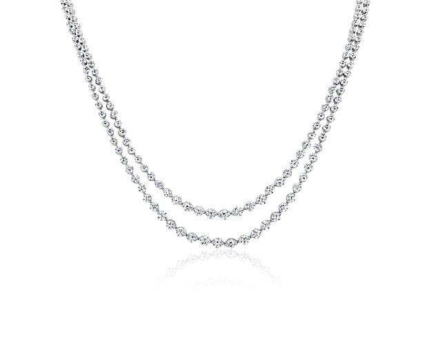 Featuring dramatic sparkle, this eternity necklace features two strands of shimmering lab-grown diamonds to capture the eye. It is designed in lustrous 14k white gold that beautifully complements the diamonds.