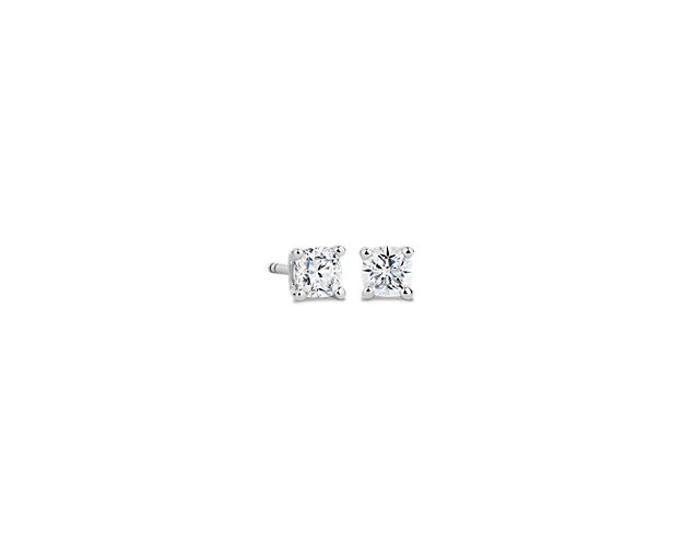 Complete your look with these elegantly classic stud earrings set with boldly sparkling cushion-cut diamonds. They feature 14k white gold design that complements the stones with a cool gleam.