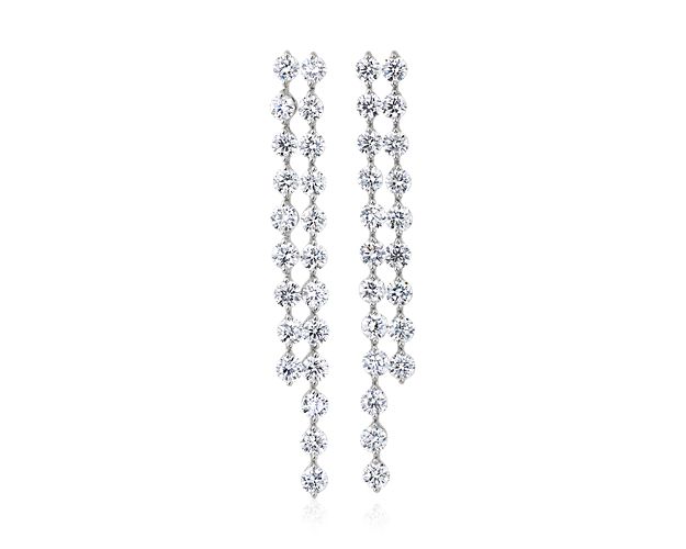 Sparkle dramatically as you catch the light wearing these drop earrings featuring dual dangling rows of stunning lab-grown diamonds. The 14k white gold design promises enduring luxurious quality and beauty.