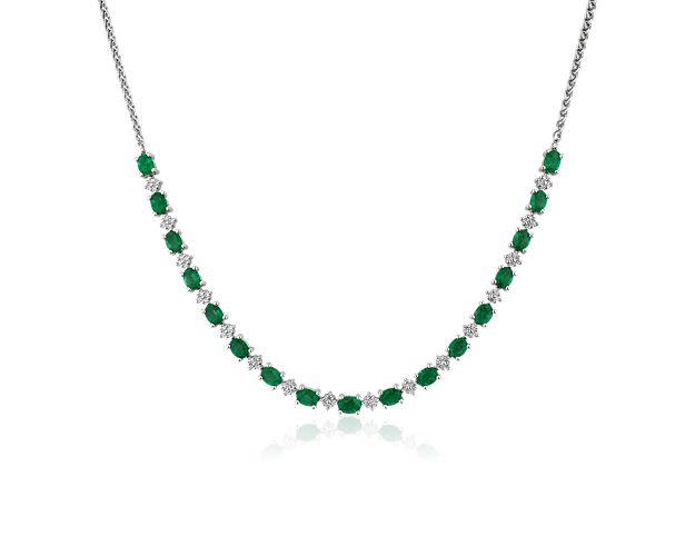 Gorgeously green oval-cut emeralds alternate with brightly sparkling round-cut diamonds in this elegant necklace. The timeless design is crafted in beautifully lustrous 14k white gold.