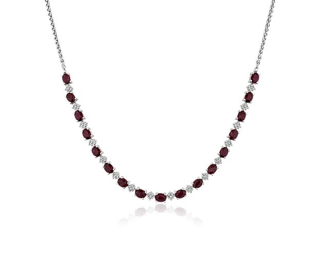 Infuse your style with a dose of brilliant sparkle when you wear this stunning necklace featuring oval-cut rubies that alternate with round-cut diamonds for a mesmerizing effect. The bright gleam of the 14k white gold design gives it a luxurious finish.