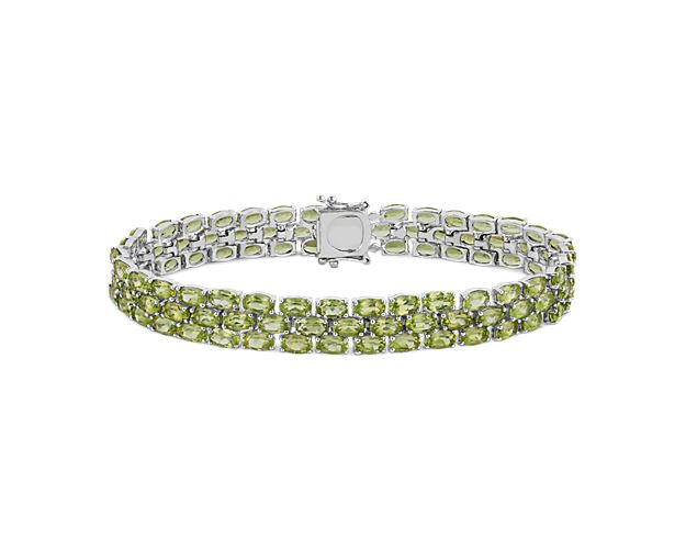 Show your true color with this peridot bracelet crafted in sterling silver featuring more than 90 oval peridot gemstones in a flexible triple line design.
