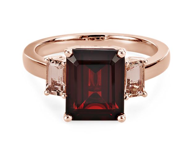 Bring bold sparkle to your hand as you slip on this stunning statement ring featuring a gorgeous garnet accented by soft pink morganite stones. The 14k rose gold design beautifully matches the warm hues of the stones.
