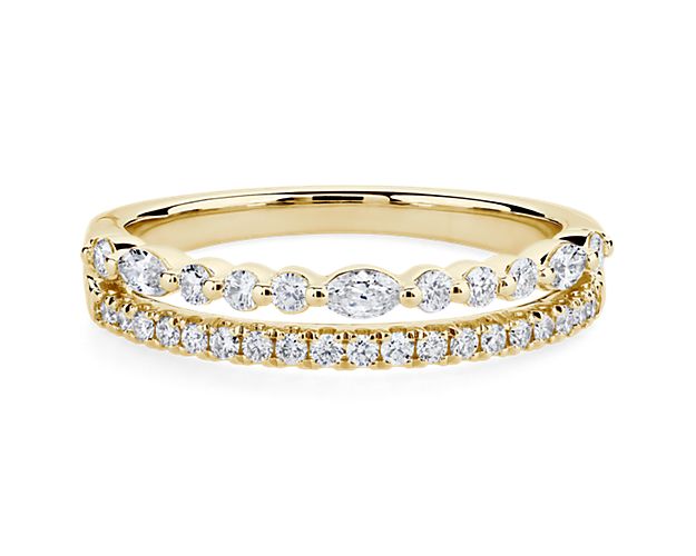 This ring shimmers with unique two-row style, with round-cut diamonds sparkling beautifully next to stunning marquise-cut diamonds. Featuring 14k yellow gold design, it promises a look of timelessly luxurious beauty.