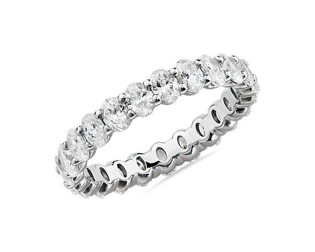 This lab grown diamond oval-cut eternity ring celebrates the brilliance of love, surrounded by the timeless shine of platinum.