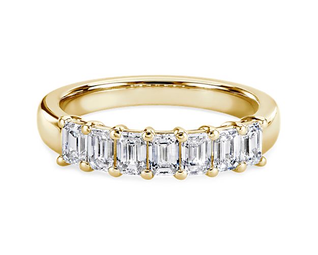 Classic and brilliant, this beautiful lab grown diamond band features seven brilliant emerald-cut lab grown diamonds set in enduring 14k yellow gold.
