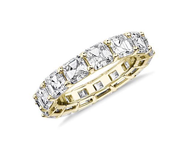 This lab grown diamond asscher-cut eternity ring celebrates the brilliance of love, surrounded by the timeless shine of 14k yellow gold.